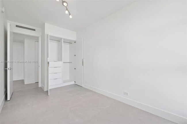 Building Photo - 5065 Collins Ave