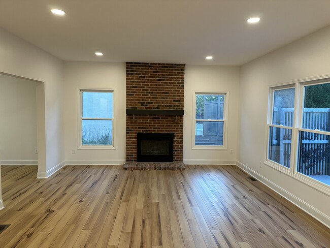 Family Room with gas fireplace - 3422 River Narrows Rd