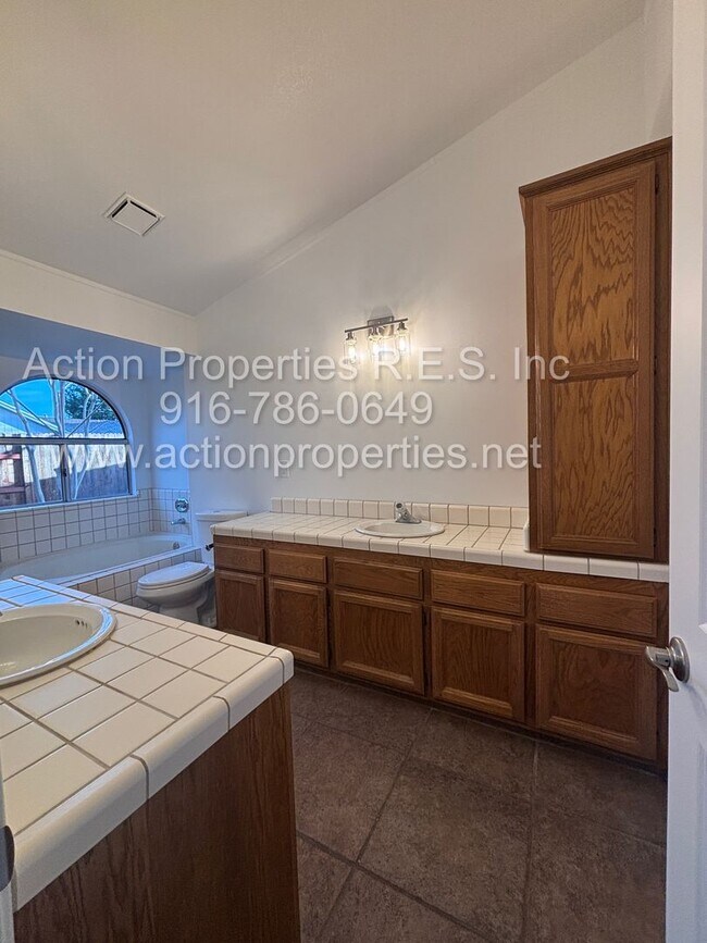 Building Photo - Action Properties RES Inc: offering Single Story, New Paint, Great Room with formal dining area, ...