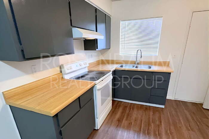 Building Photo - 6446 E Alder Ave