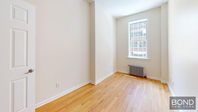 Building Photo - 52 W 56th St