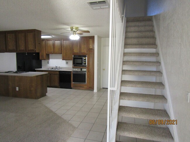 Building Photo - Centrally Located Large Two Story Condo wi...
