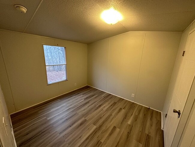 Building Photo - Two bedroom single wide on private lot off...