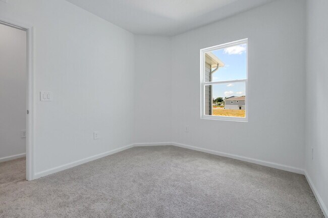 Building Photo - Beautiful New 3-Bedroom Townhome in Davenport — Includes Resort Pool, Modern Clubhouse & Family P...