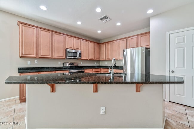 Building Photo - 8767 W Fleetwood Ln