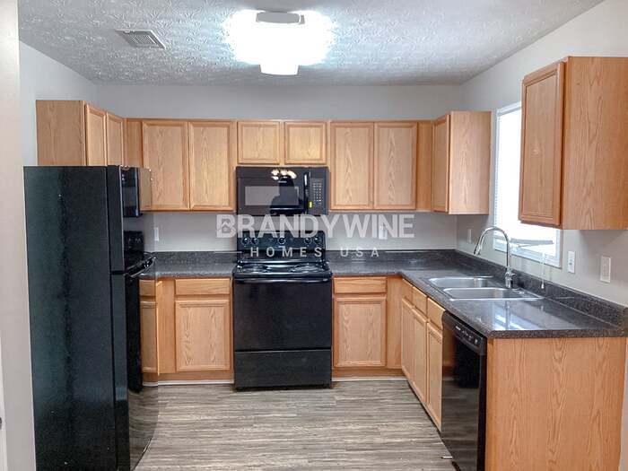Building Photo - 7132 Bowie Dr