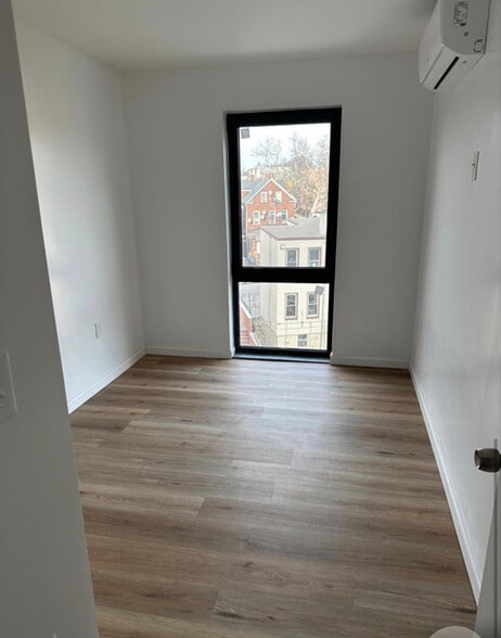 Building Photo - 70-45 45th Ave