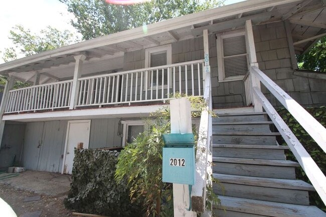 Building Photo - Simply the BEST! Adorable 1 Bedroom/1 Bath upstairs apartment home Located off Historic Camp Bowi...
