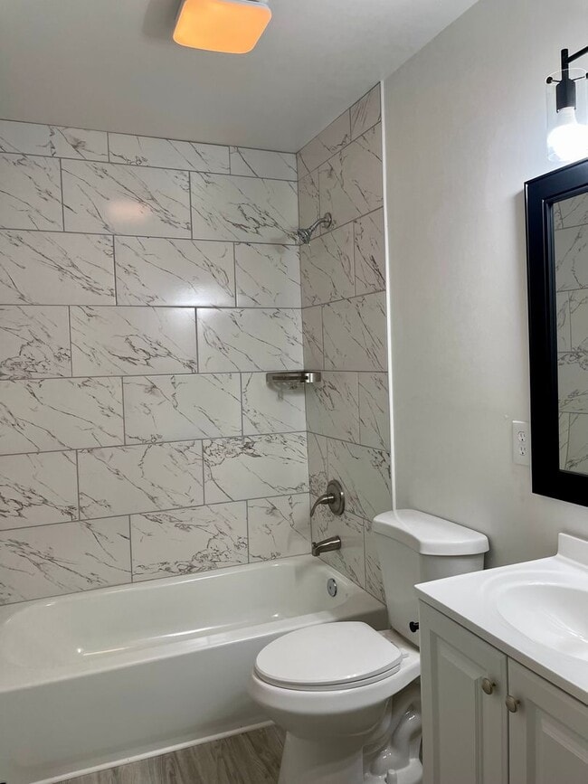 Building Photo - Updated 4 Bedroom Home with NO Carpet!