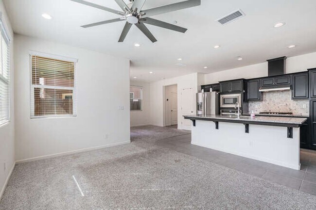 Building Photo - Charming Riverstone Home with Spacious Kitchen Island & Private Backyard & Solar