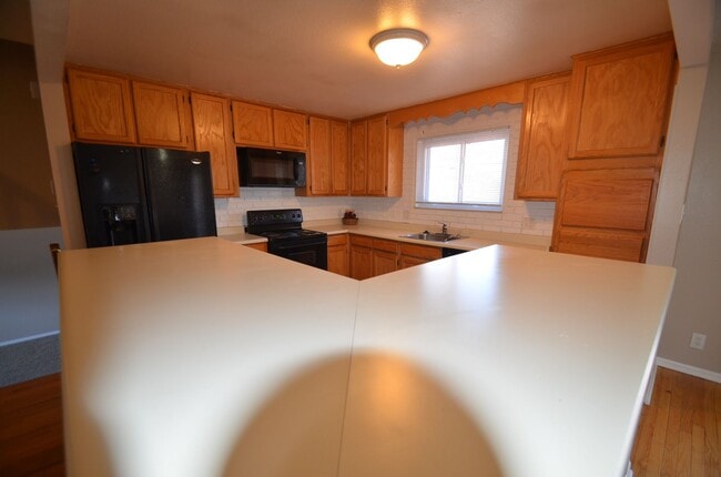 Building Photo - 4 bedroom home in Northglenn.  Newer paint with a large floor plan, wood floors & large deck for ...