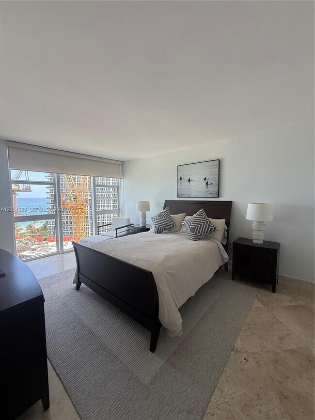 Building Photo - 10275 Collins Ave