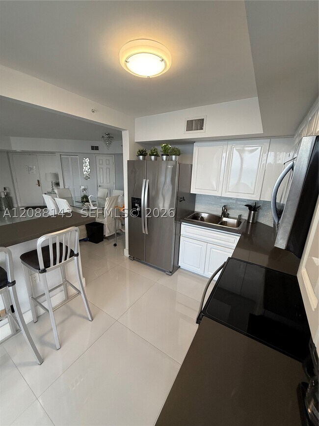 Building Photo - 6301 Collins Ave