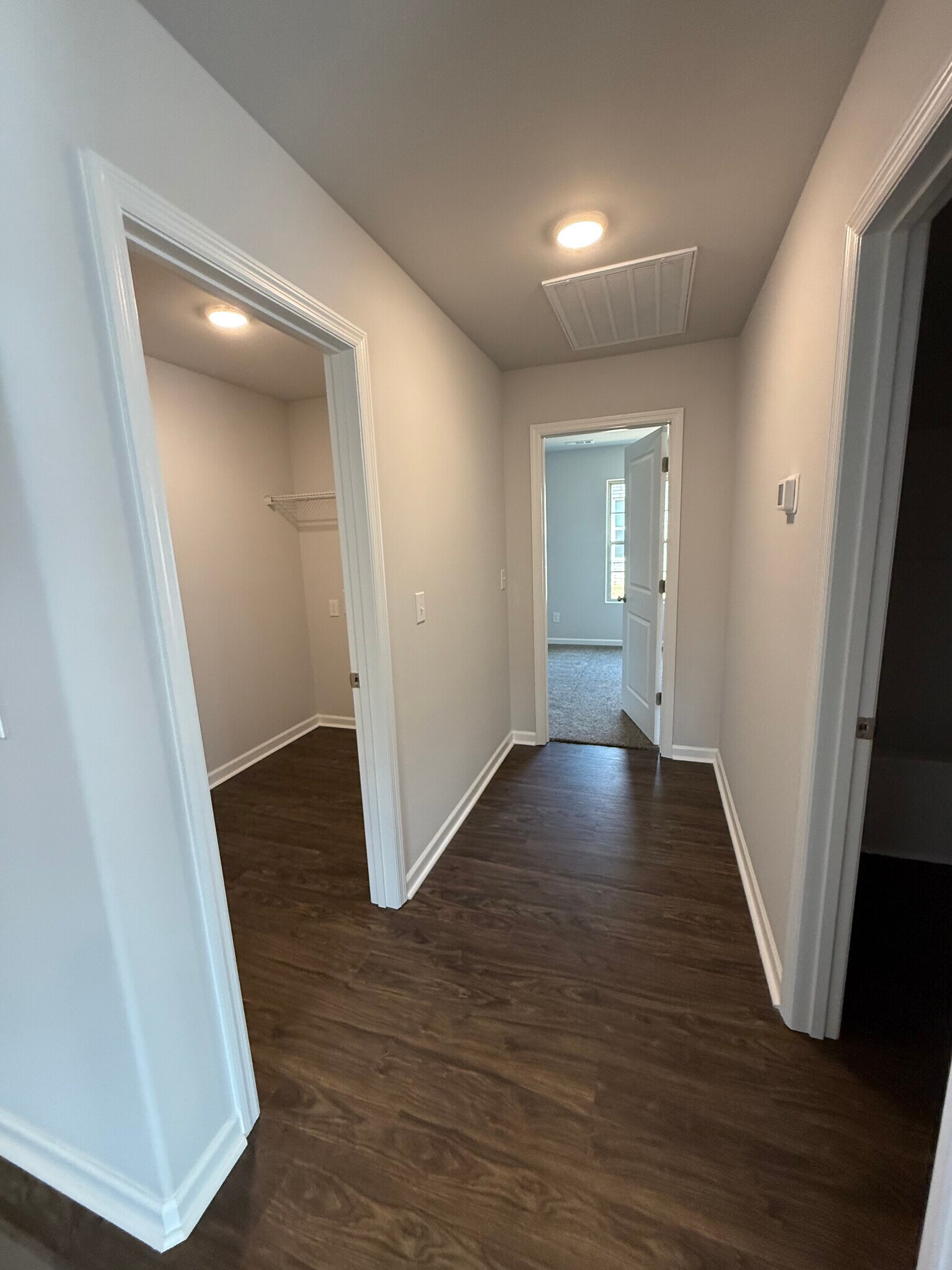 Hall leading to laundry/Garage, Guest Bed #2 and Guest Bath - 132 Stratman Dr