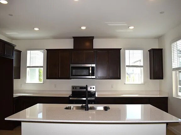Building Photo - Located in one of Elk Grove's most sought-after neighborhoods