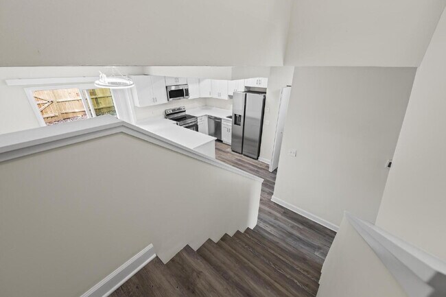 Building Photo - "Charming 2-Bedroom Townhouse Retreat with...
