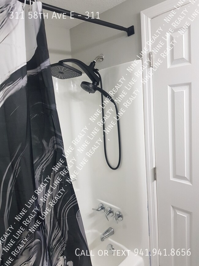 Building Photo - 311 58th Ave E