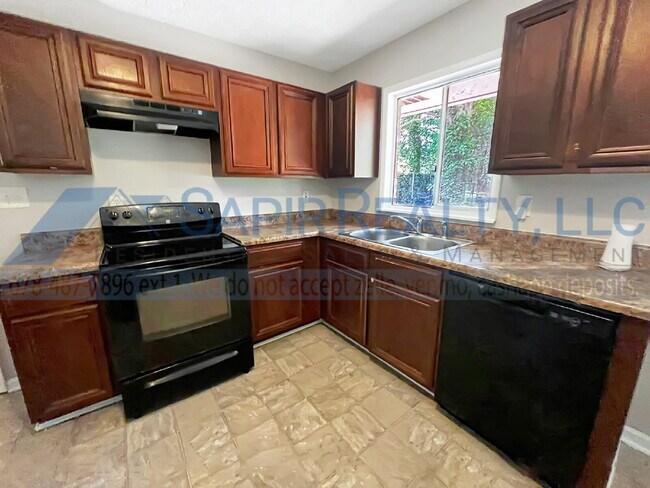 Building Photo - 1423 Hatchcover Circle - Back by Popular D...