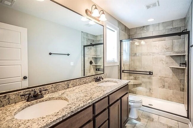 Building Photo - Spacious 4 Bedroom Home in Sugar Creek Wau...