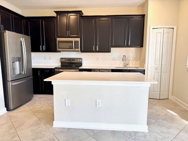 Building Photo - For Rent in ChampionsGate 3/2.5 Townhouse with Water View