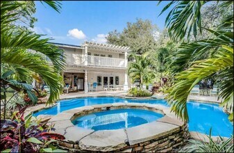 Building Photo - Furnished home on Palma Sola Bay with dock...