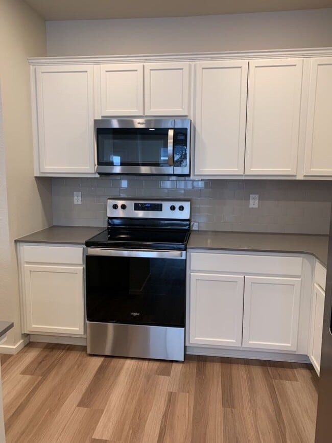 Building Photo - 3 Bed / 2.5 Bath Townhome with Attached Garage in NE Ft. Collins