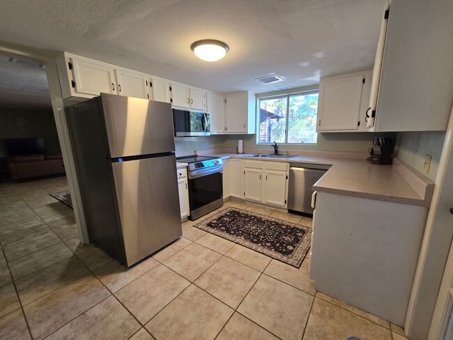 Building Photo - Furnished, 1-Year Long-Term Rental **Leasing Special $250 Off first two month rent with a year le...