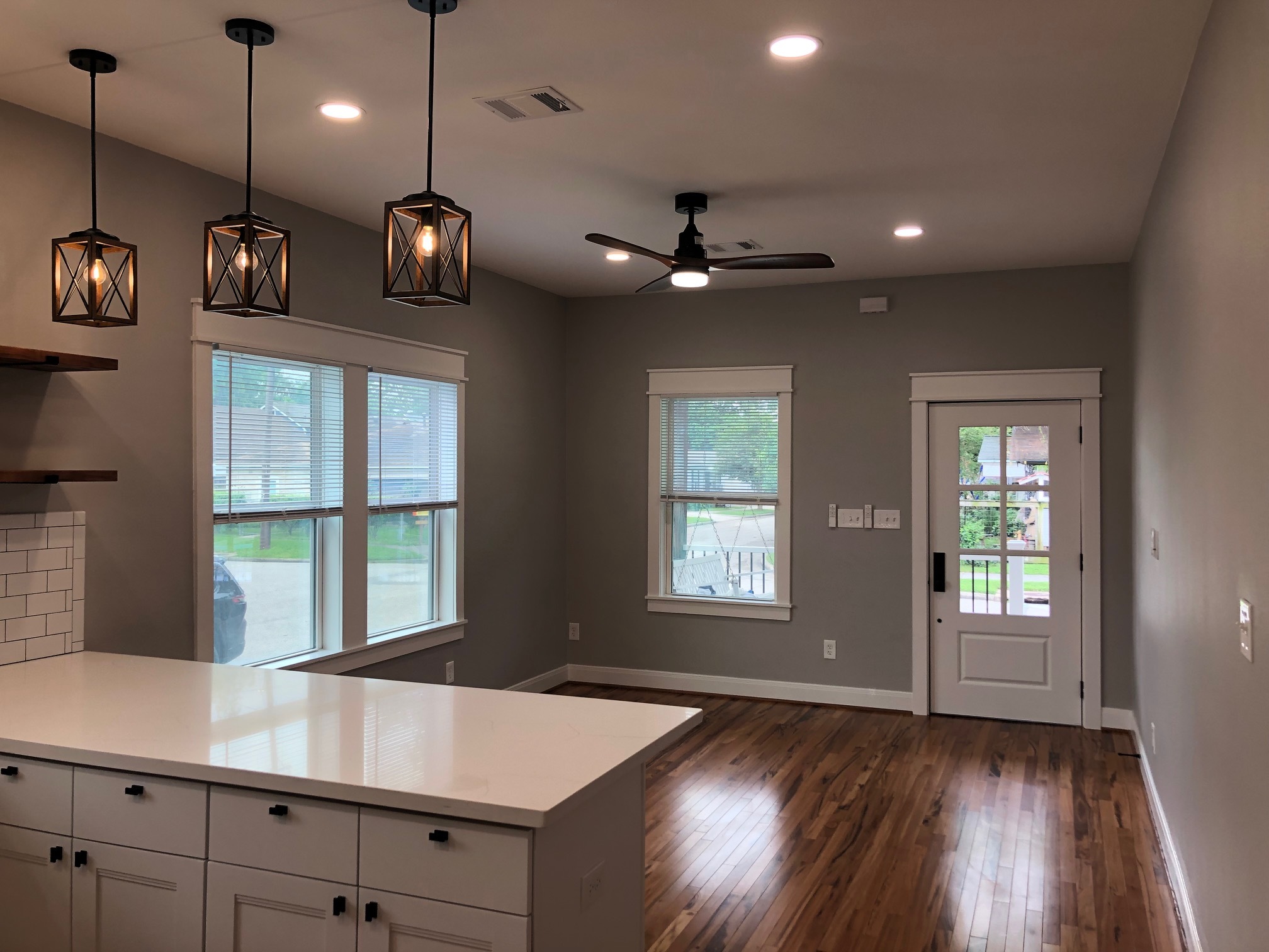 Main living and kitchen area with an abndance of natural light throughout the home - 1004 Adele St