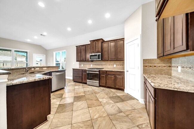 Building Photo - Welcome to this well-kept, single-story gem located in the Villas of Mia Lago!