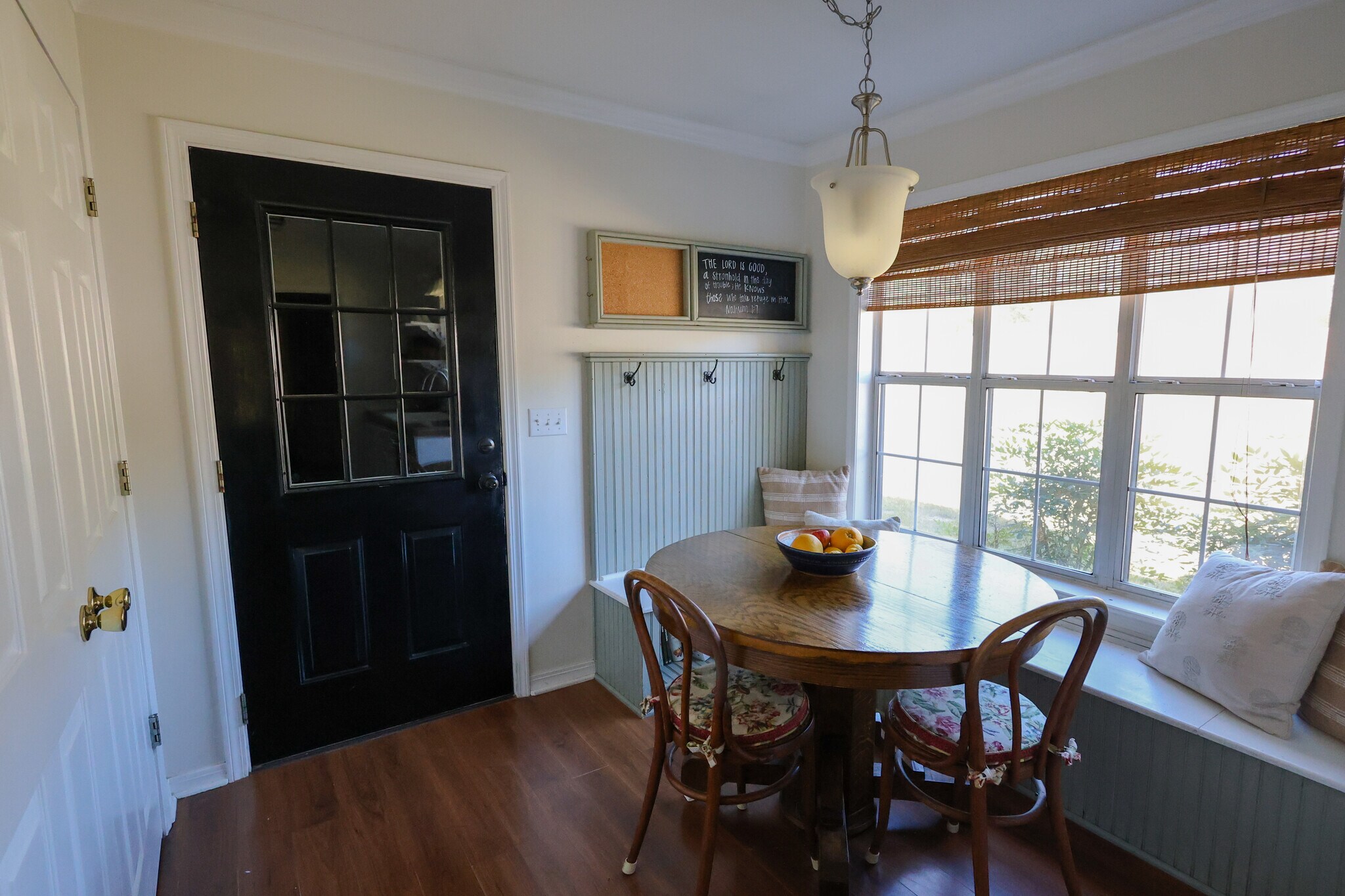 Two door laundry closet across from this table to the left of garage door. - 15 Caitlin Ave