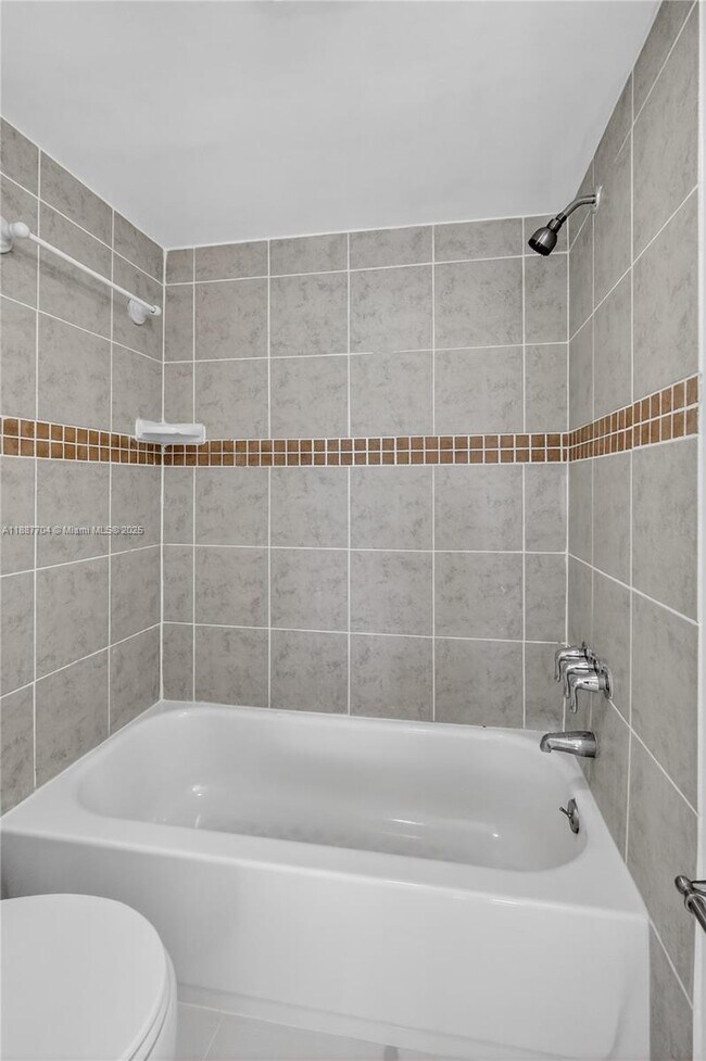 Building Photo - 9915 W Okeechobee Rd