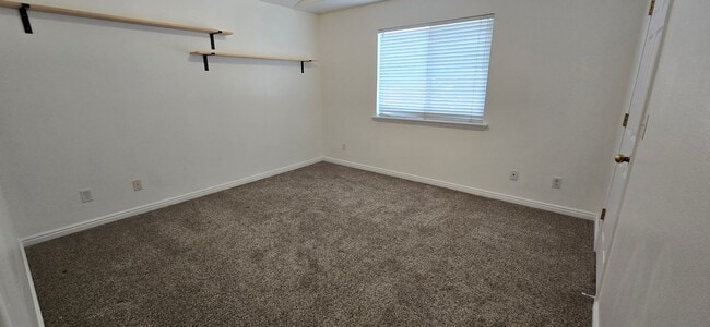 Building Photo - 8084 N Ridge Loop E
