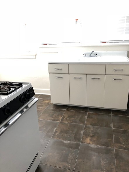 Kitchen Tiled Floor - 1134 N Gardner St