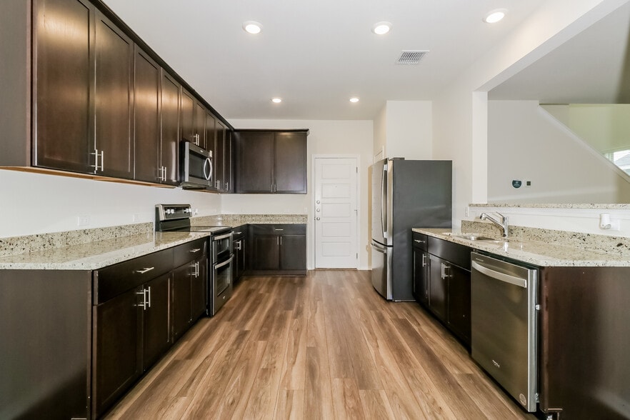 Building Photo - The Corridor at Sunset Oaks Rental Homes