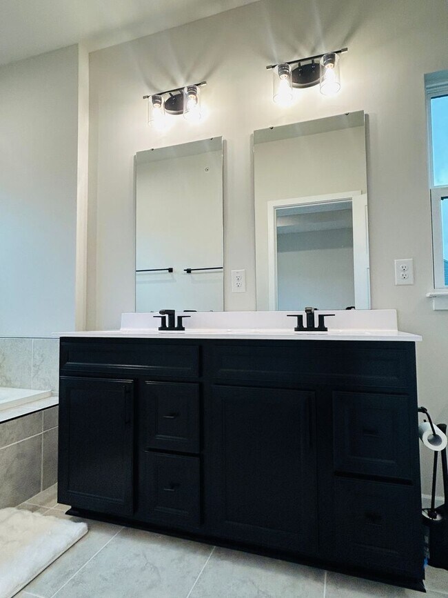 Building Photo - New Construction • 4 BR • 2 Full / 2 Half BA • End Unit Townhome in Village Town – Fayetteville’s...