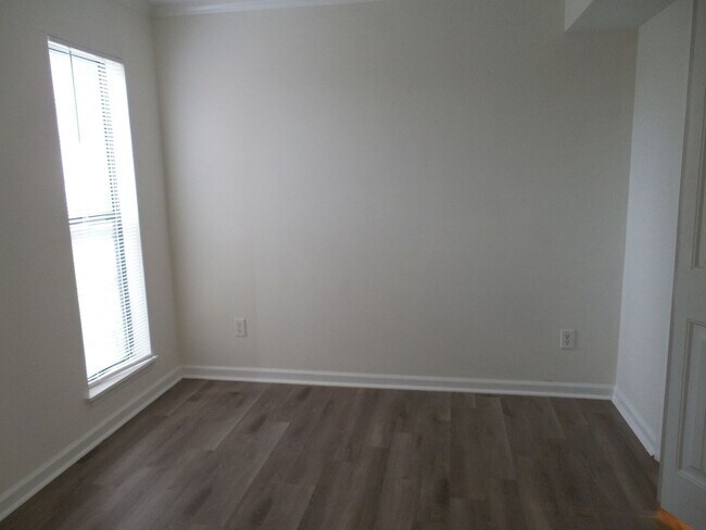 Building Photo - End Unit Condo Available now