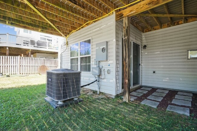 Building Photo - This beautiful townhome spans three finished levels and over 2800 square feet.