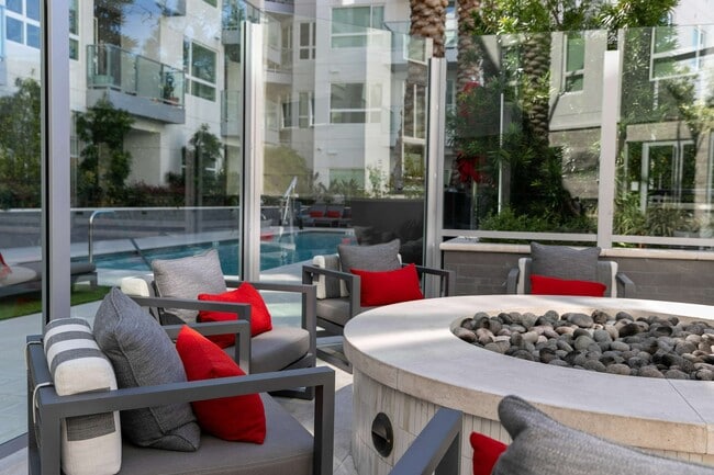 Gather around the fire for cozy evenings outside. - Diridon West