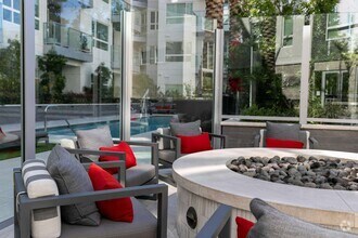 Gather around the fire for cozy evenings outside. - Diridon West