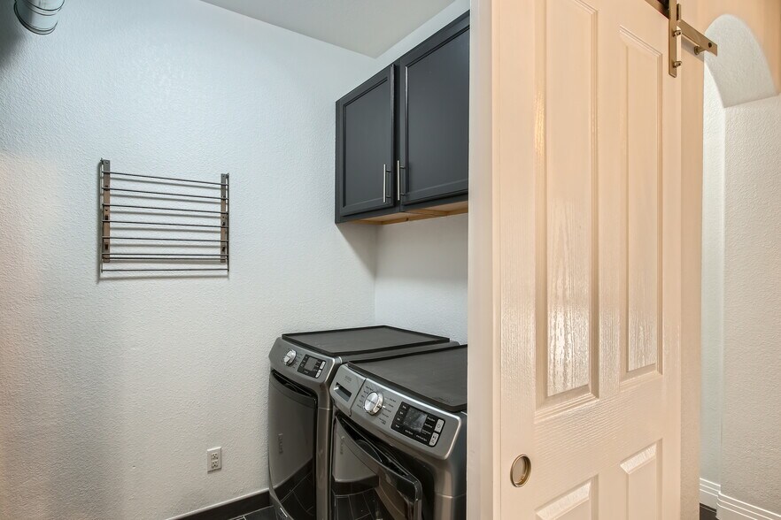 In-Unit Laundry Room - 7349 Lowell Blvd