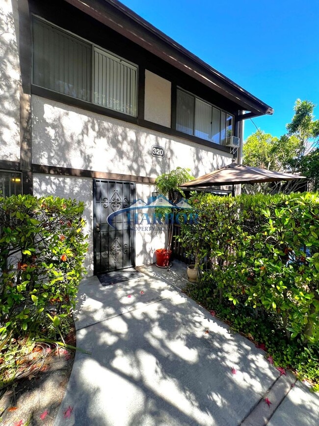 Building Photo - Charming Townhome in the Desirable Mirales...