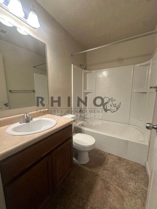 Building Photo - 6941 Village River Ln