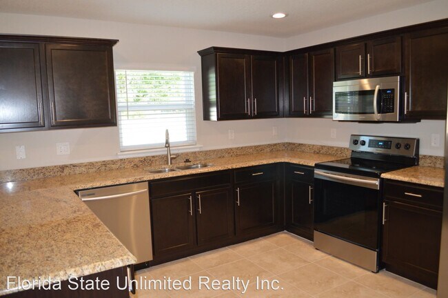 Building Photo - 3 br, 2.5 bath House - 9539 Tocobaga PL