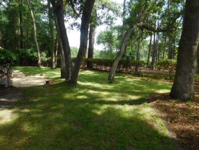 Building Photo - Beautiful Custom Unfurnished Home Located In Sea Pines Resort