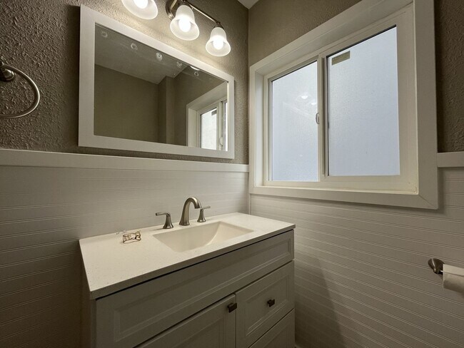 Building Photo - Three-Bedroom Home with Updated Kitchen & Vaulted Ceilings