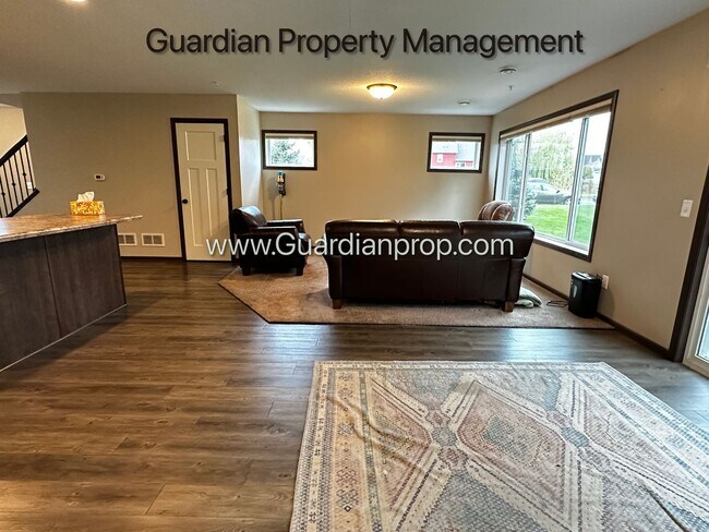 Building Photo - Lakeville Corner Unit, Walk out Patio, 2 Car Garage, W/D on Upper Level, 2.5 Baths