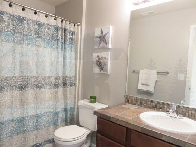 Building Photo - Beautiful 4 Bedroom Home located in a Gate...