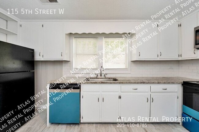 Building Photo - 115 5th St W