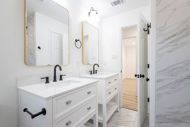 Building Photo - Large Open-Concept 4 Bedroom with Stunning Pond Views!