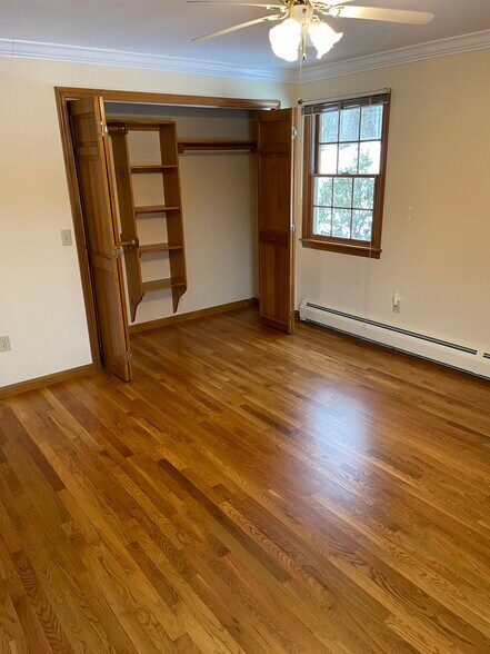 Bedroom has two windows and two closets. - 123 Riverlin St